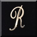 J144. Goldtone ”R” pin - $12 